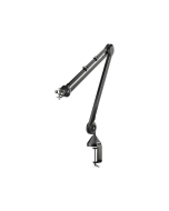 RØDE PSA1 studio boom arm mounted on a desk with a professional microphone and shock mount attached.