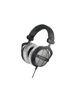 Beyerdynamic DT 990 PRO 250 Ohm headphones featuring the iconic open-back grille and gray velour cushions for professional studio use.